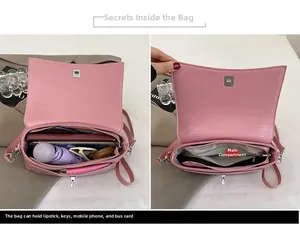 Innenansicht der rosa Schultertasche aus Wachsleder mit zwei Fächern und Reißverschluss