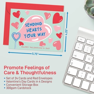 Set of 24 Valentine's Day cards with 4 heart designs and red envelopes on a desk