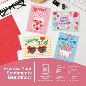 Thick cardstock Valentine's Day cards with red envelopes in a desk setting