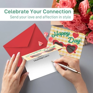 Macro shot of writing on a yellow checkered Valentine's card with a red envelope