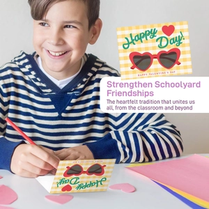 Boy preparing yellow heart-themed Valentine's Day school exchange cards with school supplies