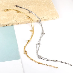 Double-layer stainless steel butterfly anklet with cubic zirconia in gold and silver