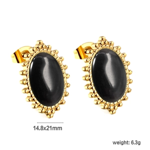 Detail view of oval gold stud earrings with black stones measuring 14.8x21mm and 6.3g