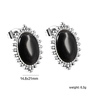 Detail view of oval white cat eye stud earrings with retro beaded edges and size measurements