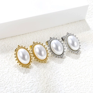 Vintage oval stud earrings in gold and silver with white stones and beaded edges