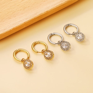 Minimalist 18K gold and silver stainless steel huggie earrings with oval cz stones