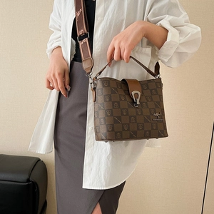 Brown printed leather bucket bag with wide shoulder strap and kangaroo metal ornament