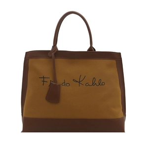 Retro canvas tote bag with Frida Kahlo print and brown leather handles on white background