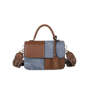 Fashionable color-block small square bag in brown leather and blue denim with wide strap