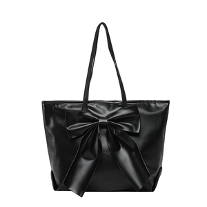 Sac cabas en similicuir noir avec grand nœud décoratif et deux poignées fines