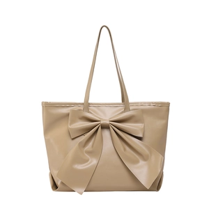 Sac fourre-tout beige minimaliste avec grand nœud et longues bretelles fines