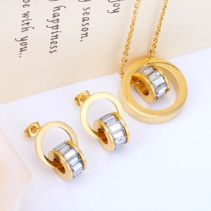 Elegant gold stainless steel jewelry set with sparkling crystal circle pendant and earrings