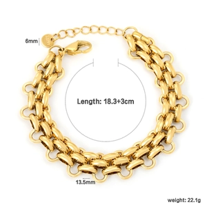 Detail of chunky gold stainless steel cuban link chain bracelet with lobster clasp and tag