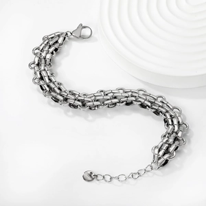 Detail of silver stainless steel curb chain bracelet with lobster clasp and extension