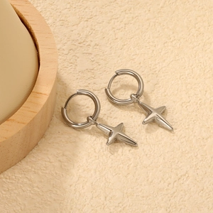 Polished stainless steel hoop earrings with 3D star charms in minimalist silver finish