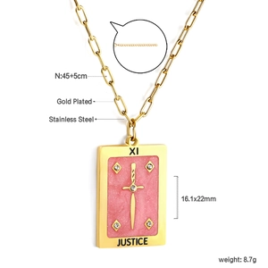 Macro detail of Justice Tarot card pendant with pink resin and gold-plated sword