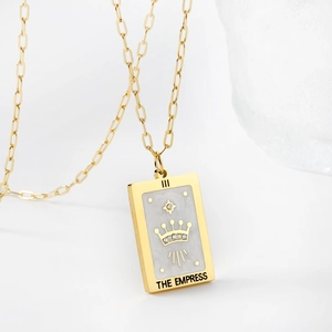 Gold-plated stainless steel tarot necklace featuring The Empress pendant with pearl finish