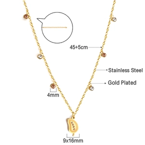 Detail view of gold plated stainless steel necklace with dimensions and material labels