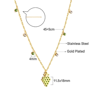 Detailed size and material specs for gold-plated grape pendant with green crystals