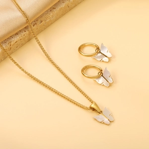 Elegant gold butterfly jewelry set with white shell inlay necklace and hoop earrings