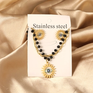 Set gioielli in acciaio inossidabile con collana di perline nere e ciondolo sole occhio