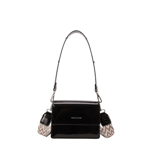 Glossy black patent leather crossbody bag with dual straps and chic chevron texture
