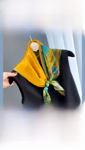 Detailed texture of yellow and green silk scarf with natural landscape landscape patterns