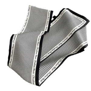 Classic houndstooth skinny scarf with contrast lettered border for versatile styling