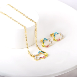 Detailed shot of hollow cloud jewelry set with vibrant multicolored crystals and gold plating