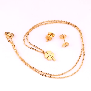 Set gioielli trifoglio dorato in acciaio inossidabile con cristalli di zirconia lucidi