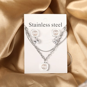 Stainless steel jewelry set featuring pearl and zircon earrings with a double necklace