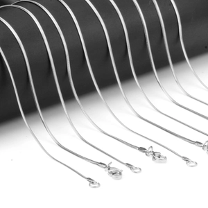 Polished silver stainless steel snake chain necklace with lobster clasp and extension links