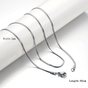 Macro shot of 2mm silver snake chain necklace with lobster clasp and 45cm length