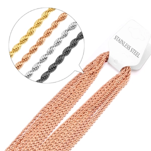 Macro detail of stainless steel rope chain necklaces in gold, rose gold, silver and black