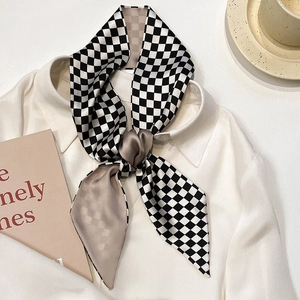 Checkered satin silk scarf for women styled on white shirt collar for elegant professional look