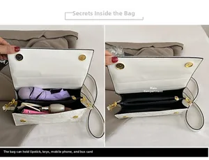 Lace handbag interior detail showing main pocket capacity for phone and umbrella