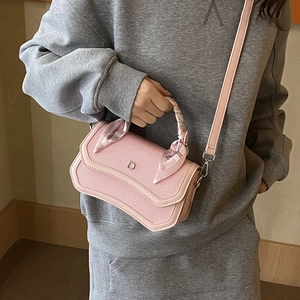 Pink woven handbag with D-buckle, silk scarf handle and crossbody strap for women