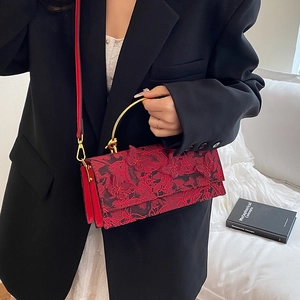 Red butterfly embroidery handbag with golden handle and crossbody strap for women