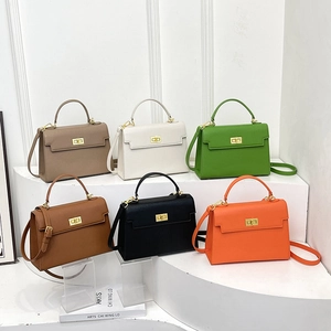 Chic Kelly-style trapezoid handbags in six colors with gold twist locks and top handles