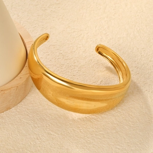 Minimalist open bangle in 18K gold plated stainless steel with high polished finish