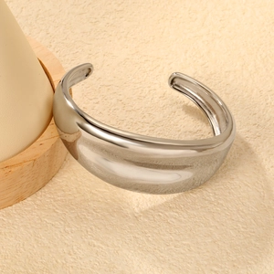 Polished silver stainless steel open bangle with sleek modern wide-band arc design