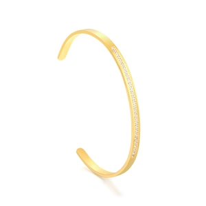 Minimalist 18K gold plated cuff bangle with channel-set crystals on a white background