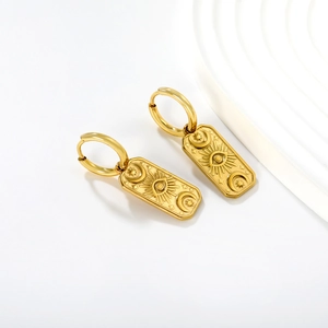 18K gold plated stainless steel drop earrings with sun moon and star celestial motifs