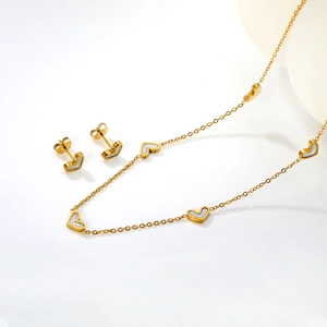 Elegant gold stainless steel jewelry set with white shell heart pendant and stud earrings