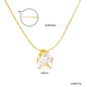 Detail of 40+5cm gold chain necklace with 6x8mm pear-cut cubic zirconia pendant