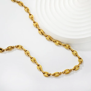 Elegant 18k gold plated stainless steel necklace with coffee bean links on white base