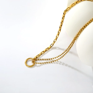 Minimalist stainless steel collarbone necklace with gold ring pendant and asymmetric chain