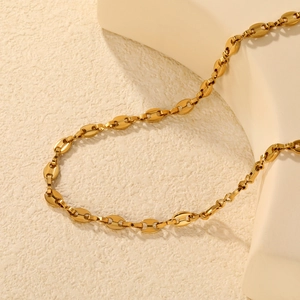 Elegant 18K gold-plated coffee bean link necklace displayed on white premium stand