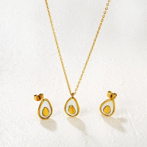 Elegant 18k gold heart shaped necklace and earring set with white enamel inlay