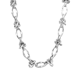 Punk style stainless steel knot link necklace with oval rings on white background